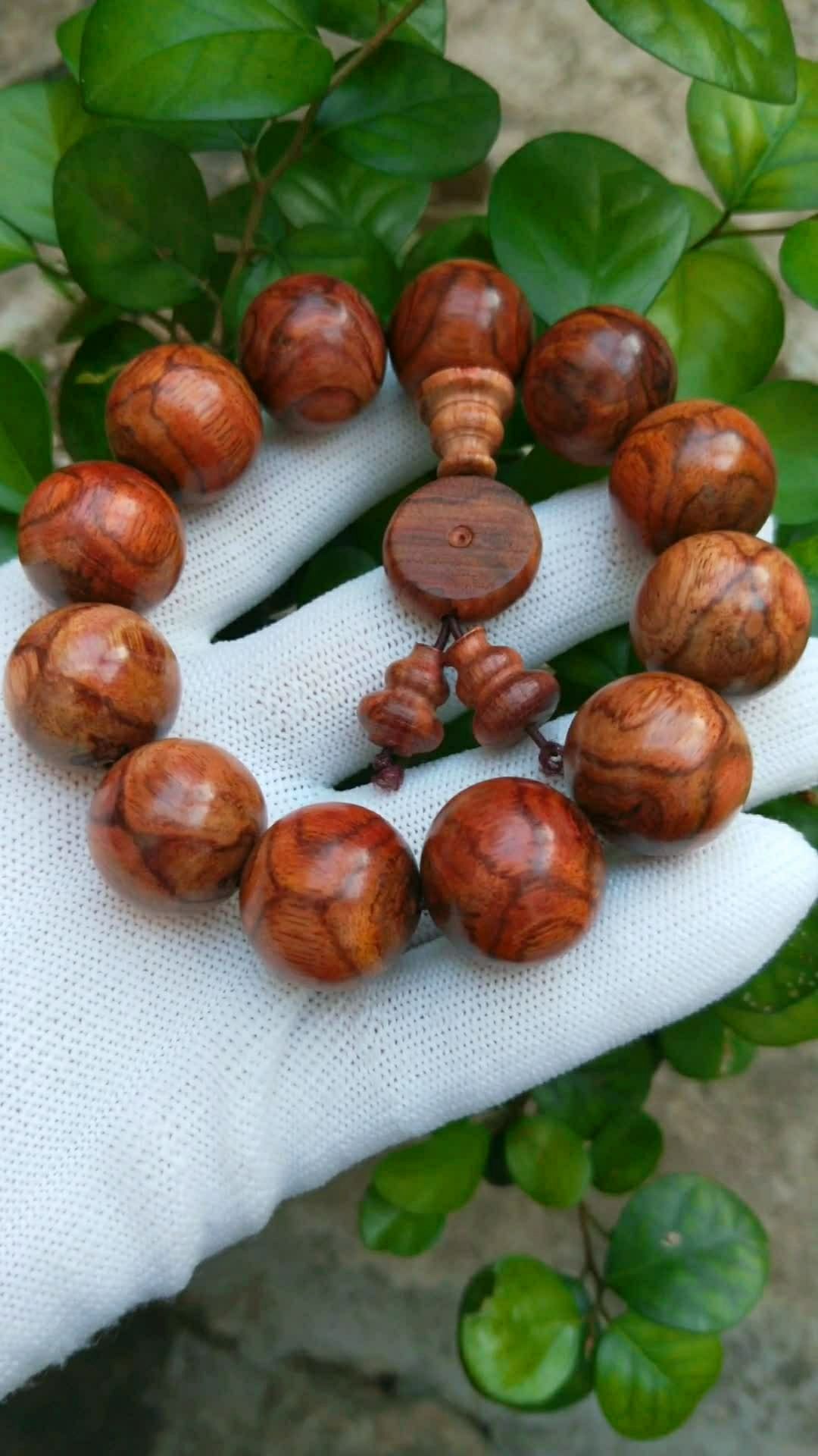 海南黄花梨2.0公分x纹对眼手串