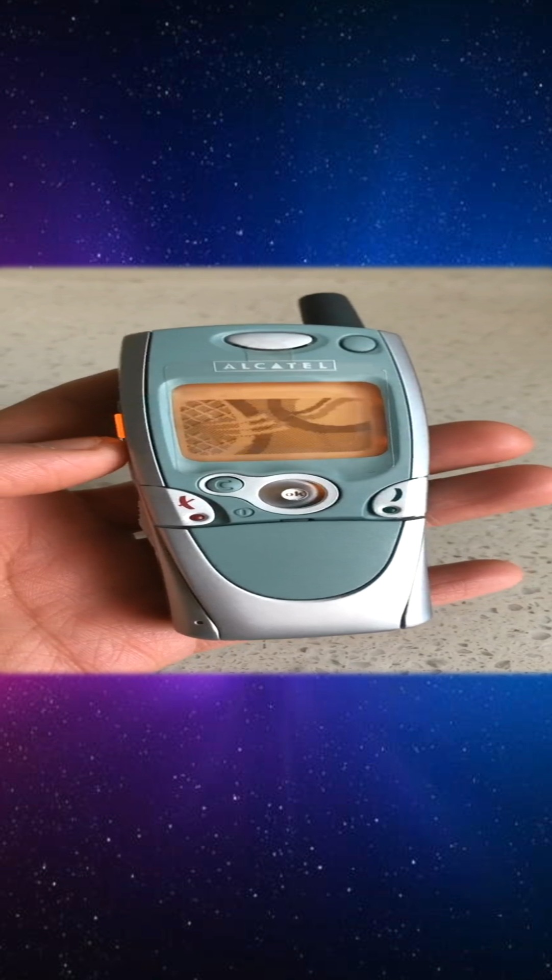 阿尔卡特ot701,经典一键自动下翻盖手机你用过吗