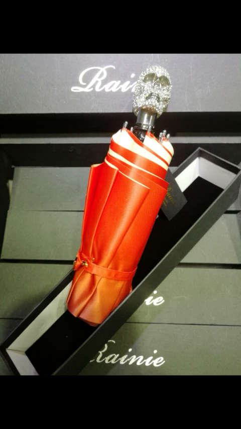 rainie雷尼,银色白钻抬头骷髅伞头, 上灰下橙渐变贡缎伞面三折伞