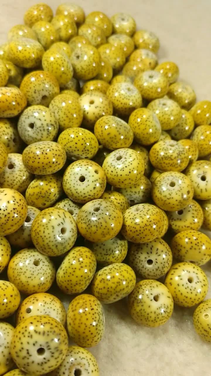 10*14原生态鸡油黄星月菩提