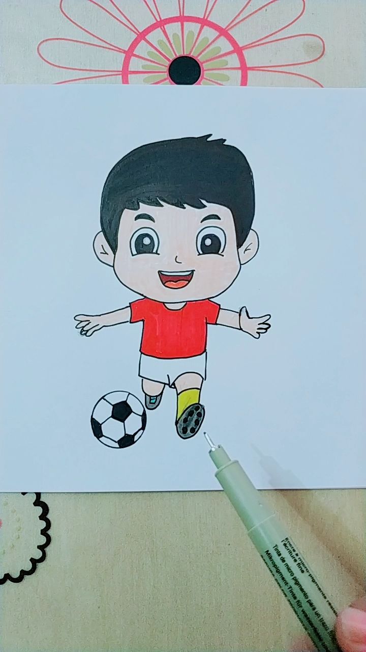 教你画踢球小男孩简笔画