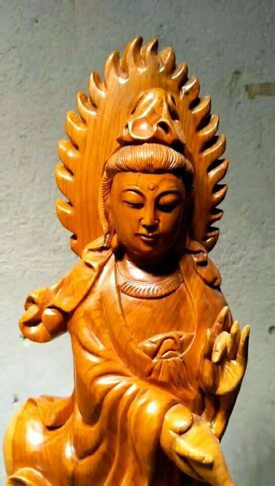 红豆杉雕刻而成的观世音菩萨050505050505