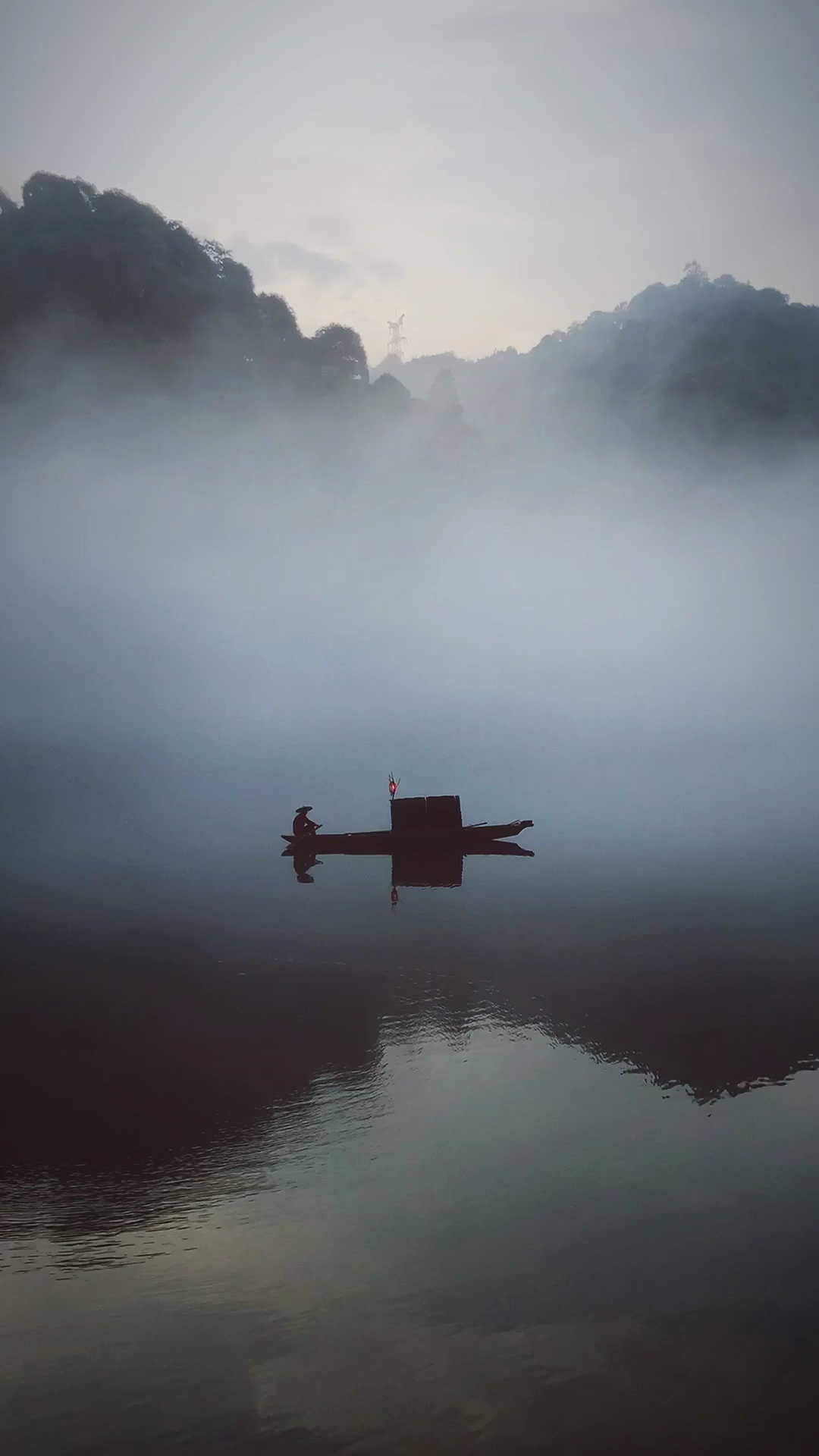 笛声悠悠,一人一舟