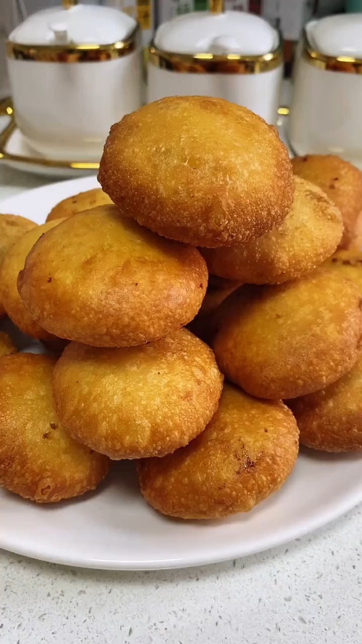 这样做炸糖糕,个个空心太好吃了,你一定要试试!