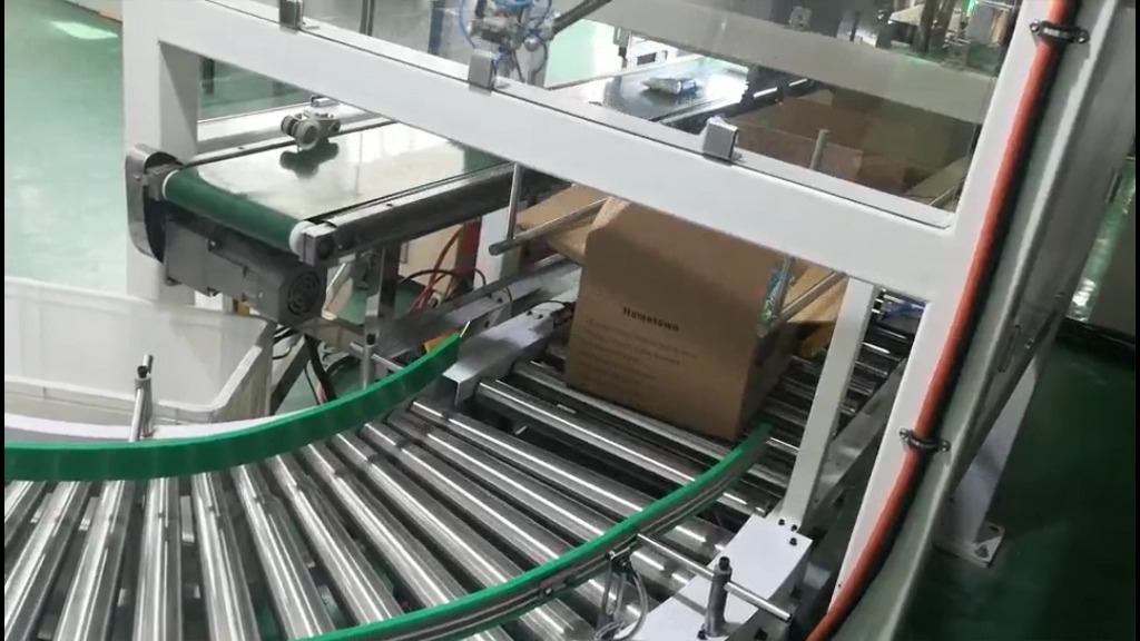 淀粉蜘蛛手全自动装箱机 全自动装箱码垛线应用