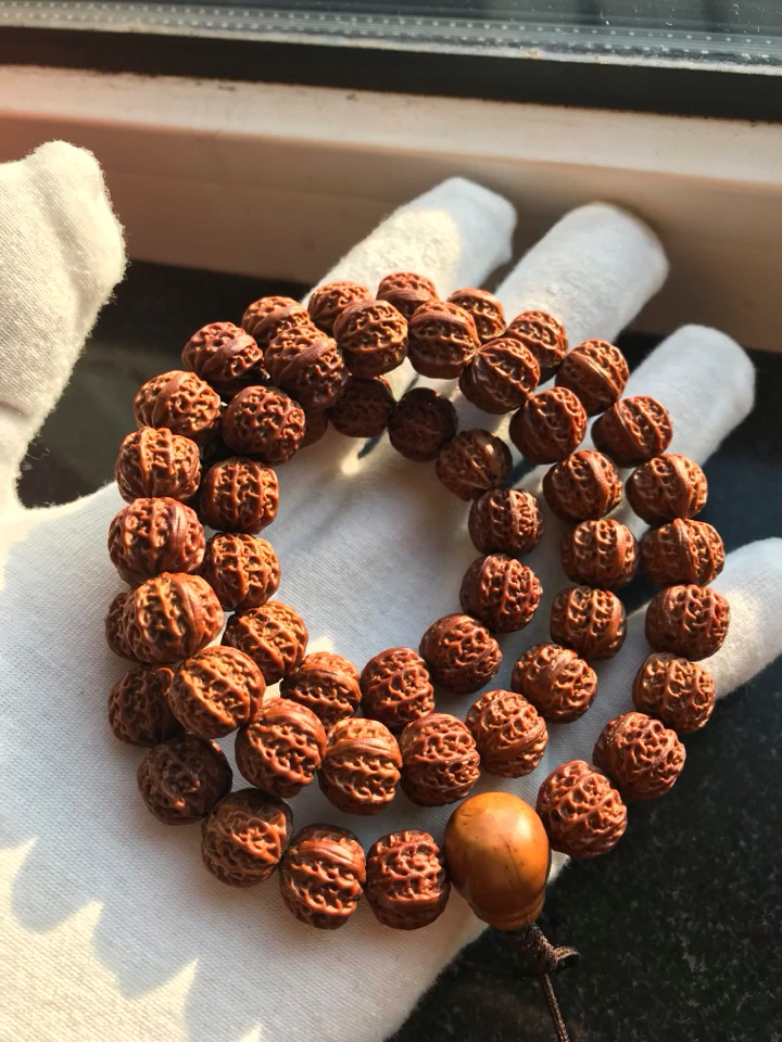 紫金鼠雕刻京八楞小核桃1.4×1.2,以假乱真