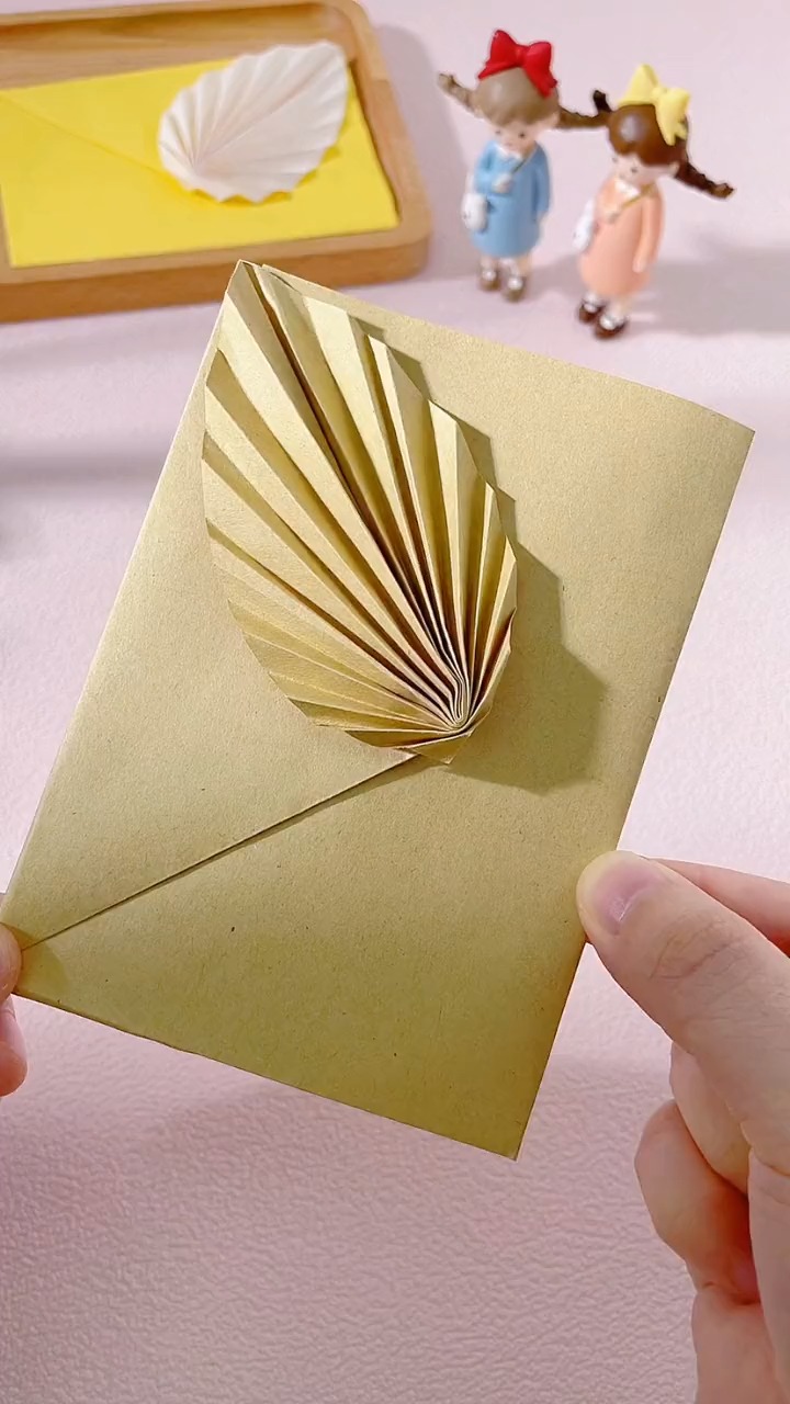 我想问一下这个相思叶信封是怎么装信的?